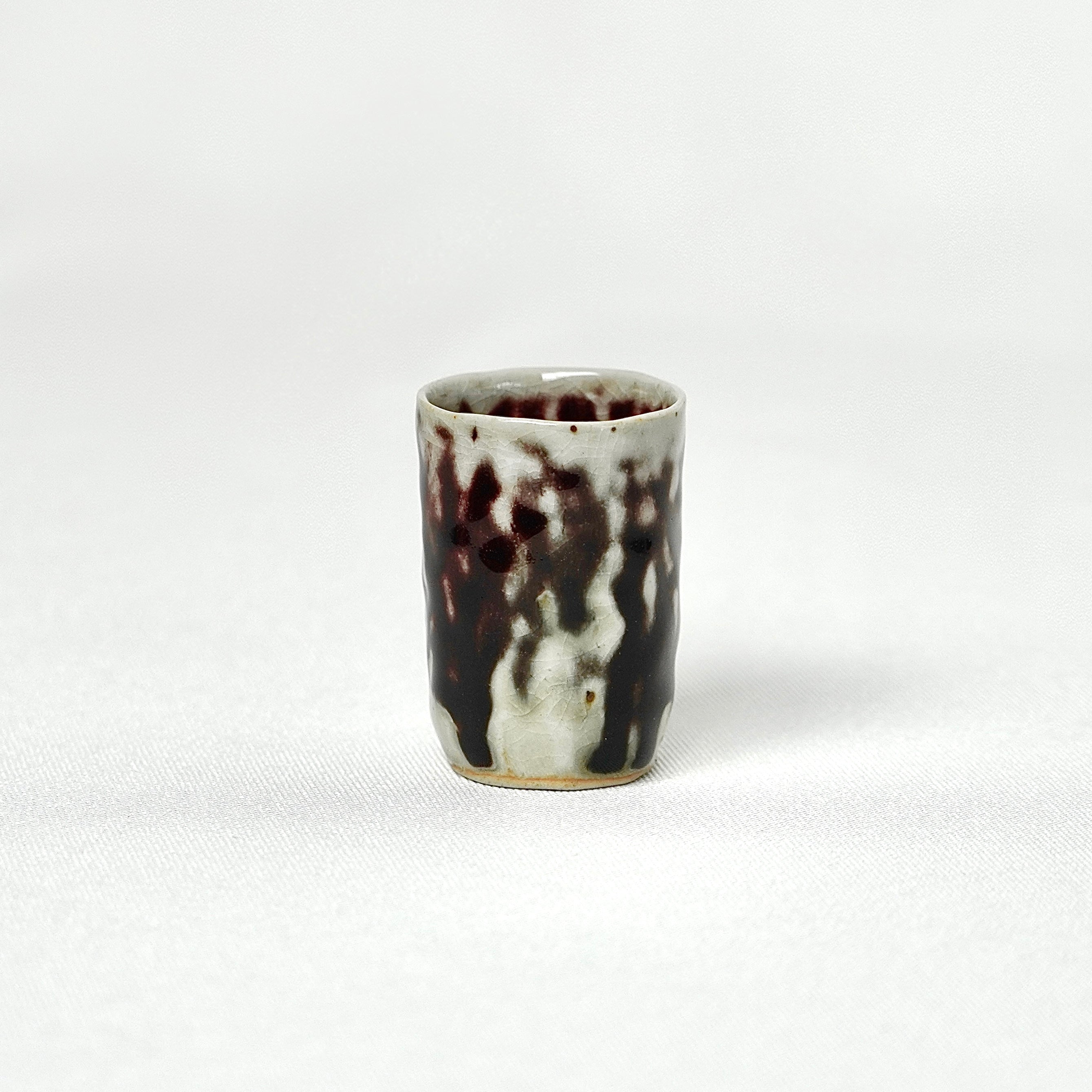 Small glazed tea cup